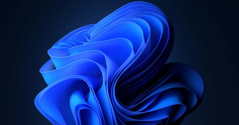 ภาพพื้นหลัง Windows 11 Bloom สีน้ำเงินบนพื้นสีเข้ม